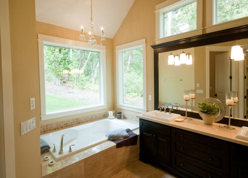 A frame can give your bathroom mirror a whole new look.