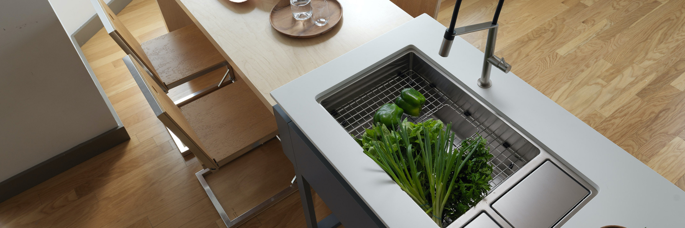 Kitchen concept with fresh vegetables in the sink