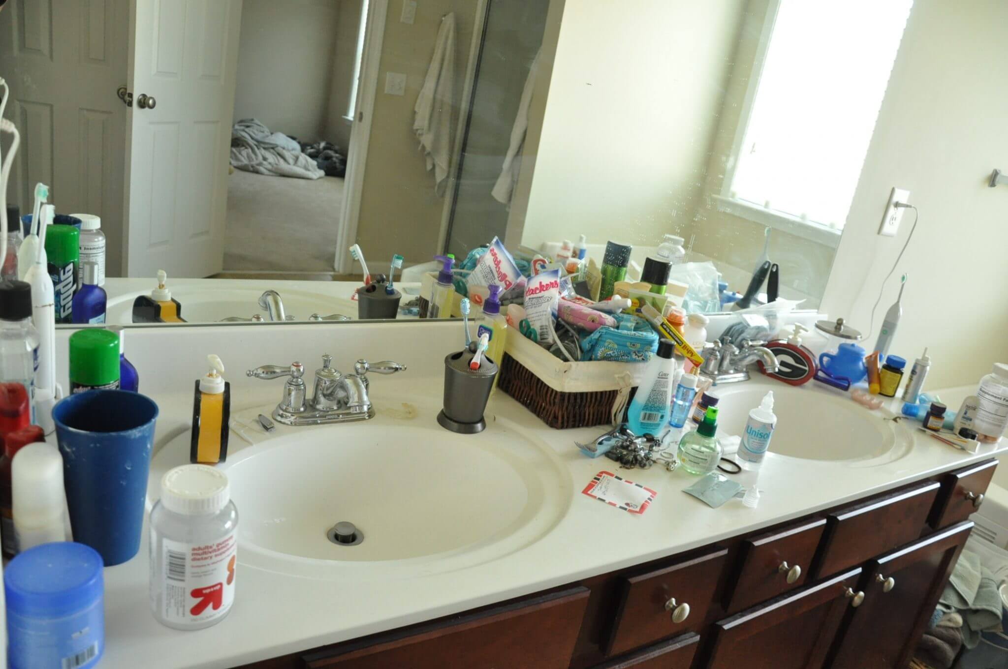6 Easy Ways to Clear Out Bathroom Clutter This Weekend - Clear the Countertop