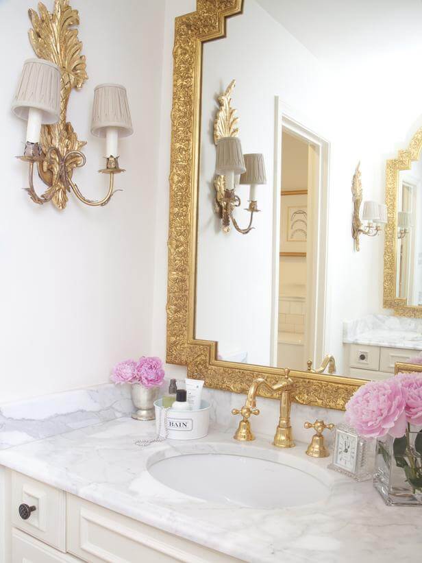 Gilded bathroom mirror